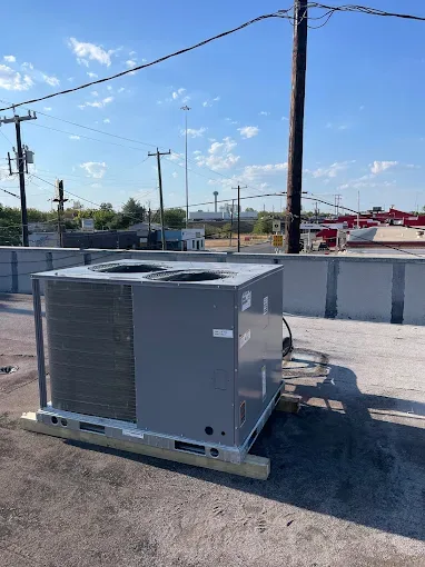 Air conditioning installation new rooftop ac unit - Howell, MI