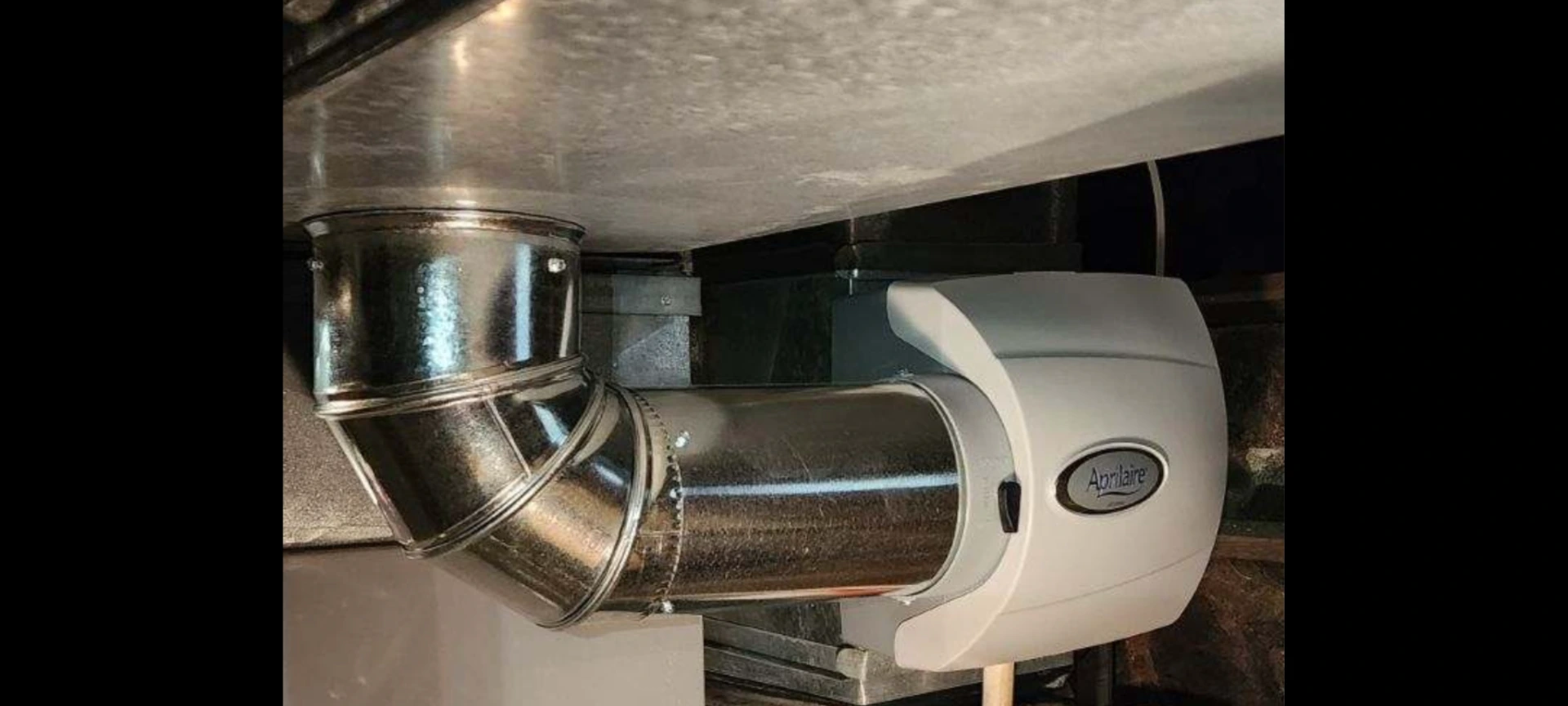 AprilAire whole-home humidifier installed on ductwork by Great Lakes Comfort in Howell, MI